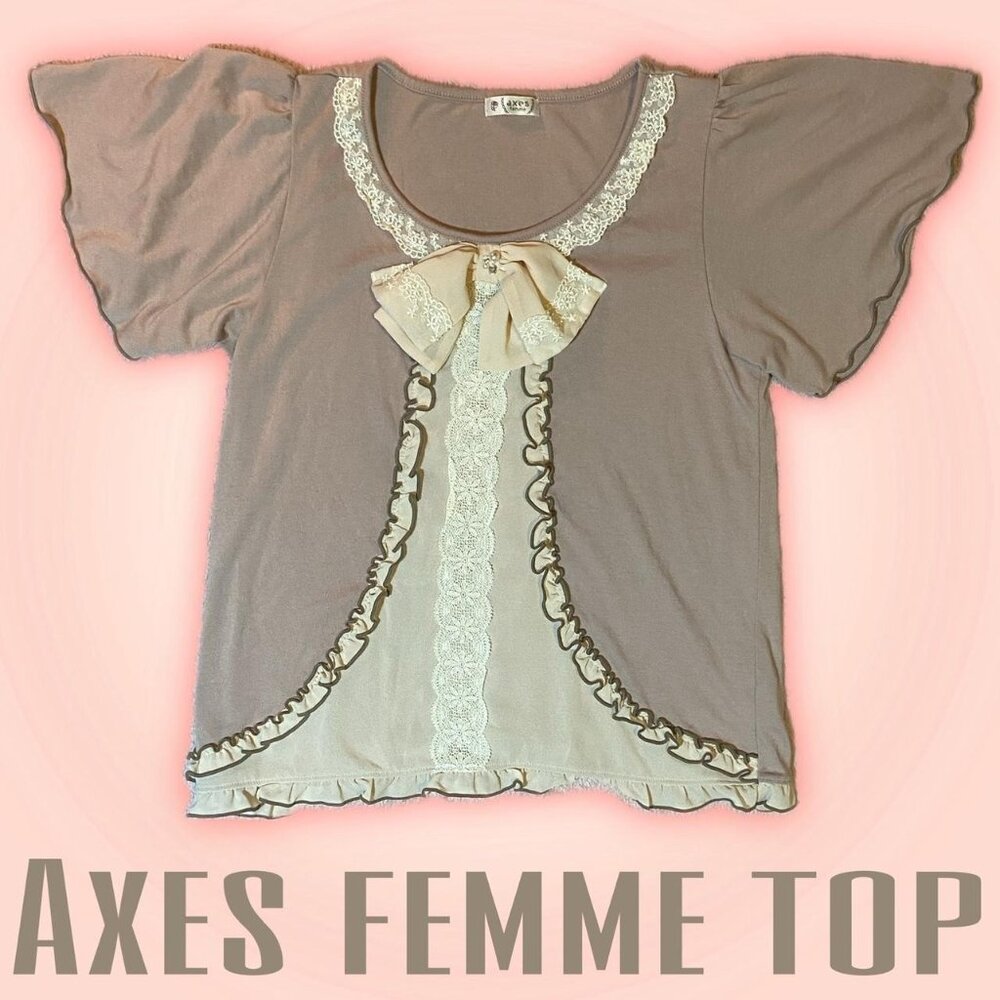 axes femme bow top it has pearls lace, and frills.